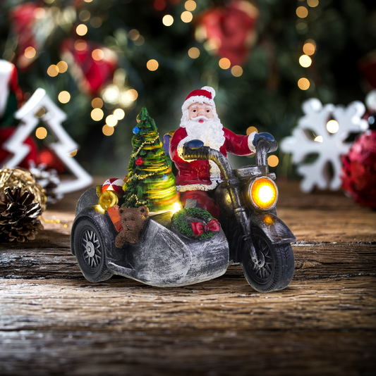 Santa na motorce s postranním vozíkem - vánoční vesnice